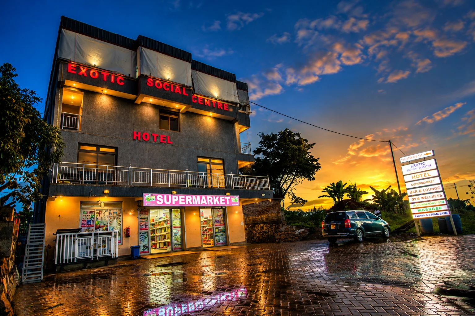 Sunset exterior with building and supermarket frontage